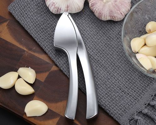 Voedingsmiddelenkwaliteit Knoflookpers Miner Ginger Crusher Peeler Squeezer 16*3cm Multi Kitchen Grater