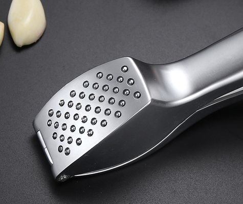Voedingsmiddelenkwaliteit Knoflookpers Miner Ginger Crusher Peeler Squeezer 16*3cm Multi Kitchen Grater