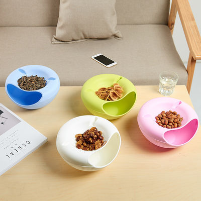 Maximaliseer de snacktijd met deze dubbellagige droge fruitcontainer en telefoonhouder
