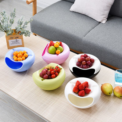Maximaliseer de snacktijd met deze dubbellagige droge fruitcontainer en telefoonhouder