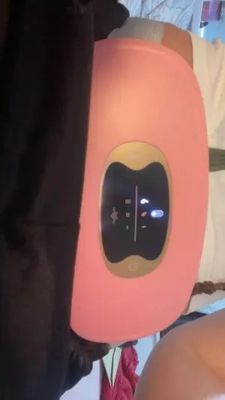 Krampijnverlichting Slimme menstruele verwarmingspad met oplaadbaar model en massageband