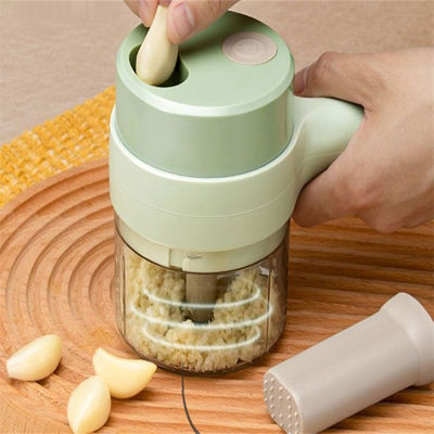 ABS 2023 Hot Gatling Multifunctionele huishoudelijke kookmachine Elektrische knoflookpuree Knoflook Automatische knoflookstoker